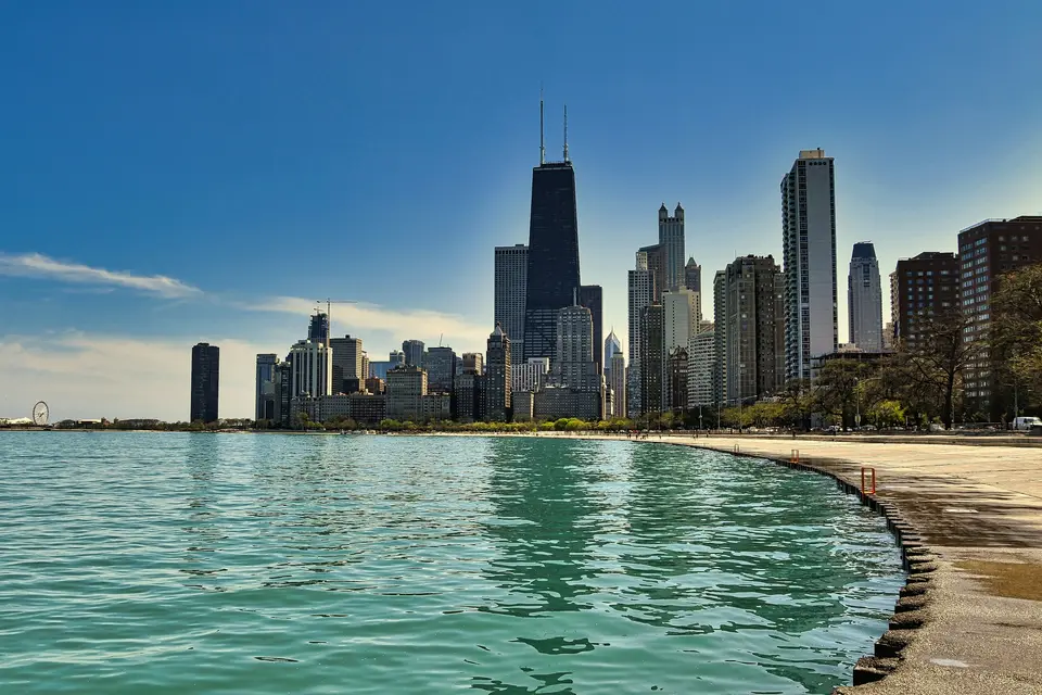 a body of water with a city in the background — Chicago
