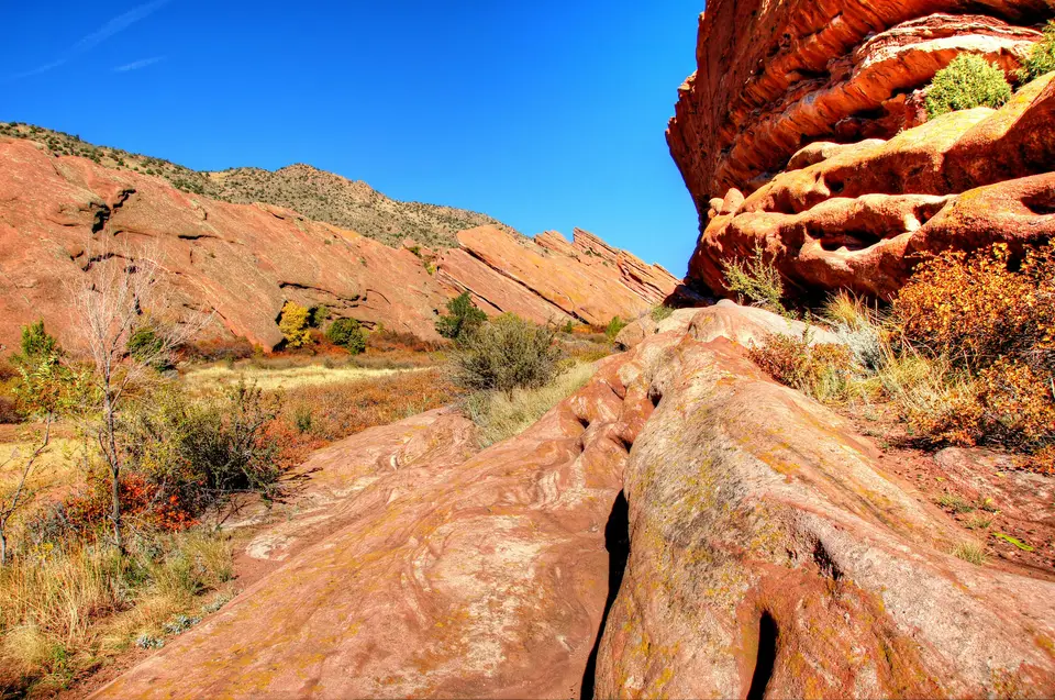 a large rock formation in the middle of a desert — Denver