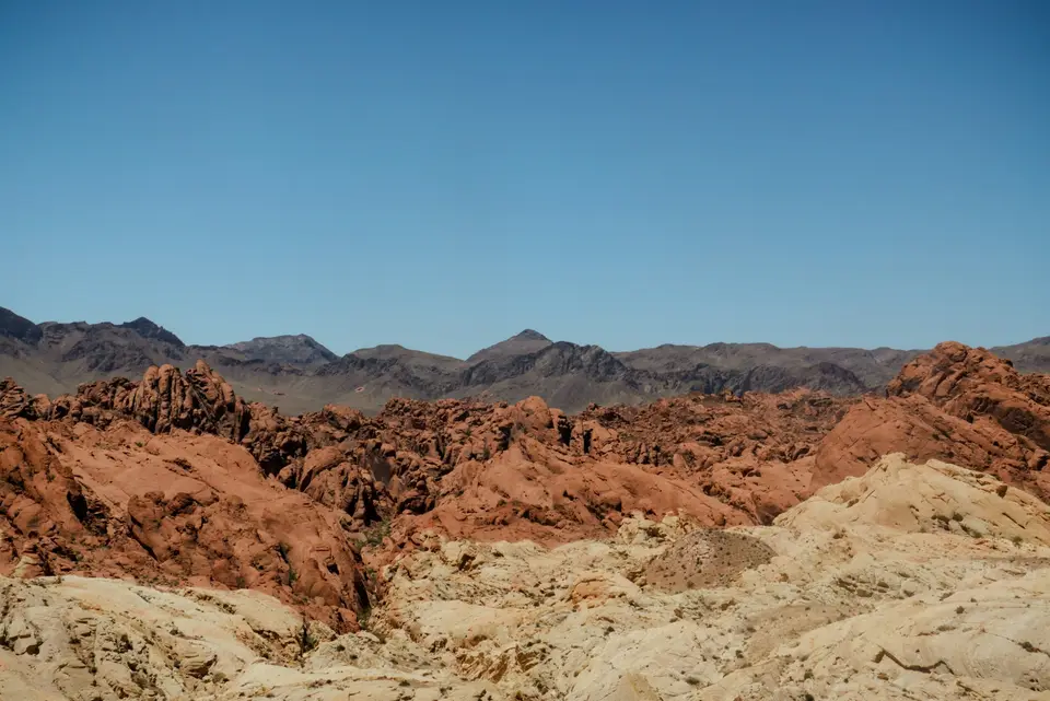 A desert landscape with mountains in the background — Las Vegas