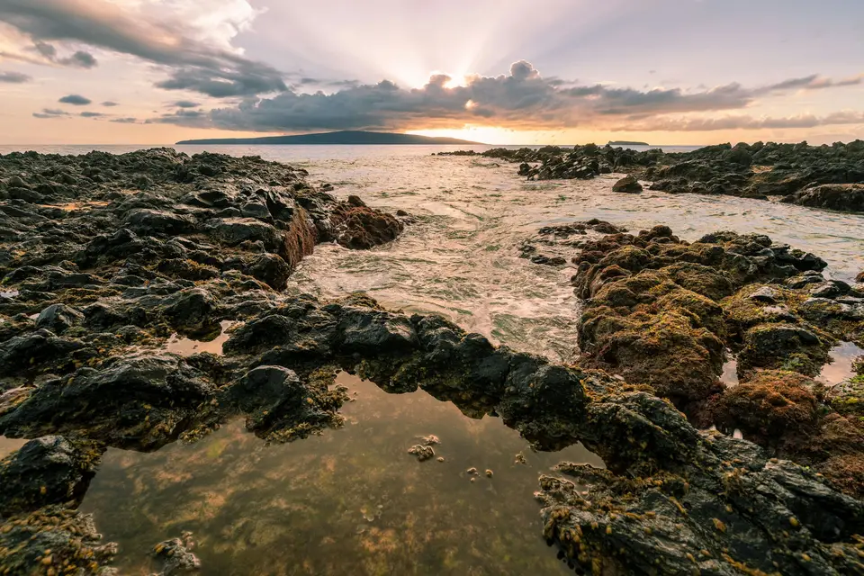 rocky shore during golden hour — Maui