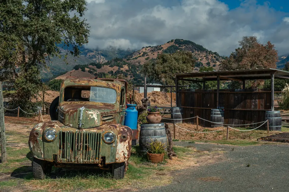 An old truck is parked in a field — Napa Valley