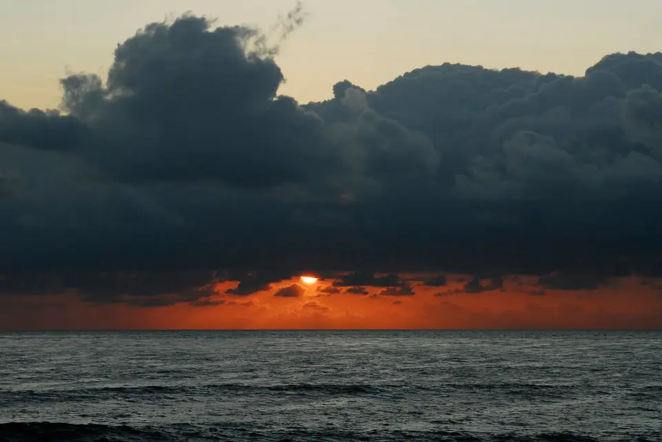 body of water under cloudy sky during sunset — San Diego