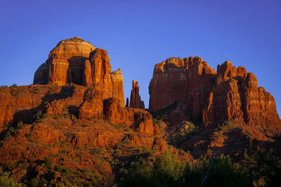 brown rock formation under blue sky during daytime — Sedona