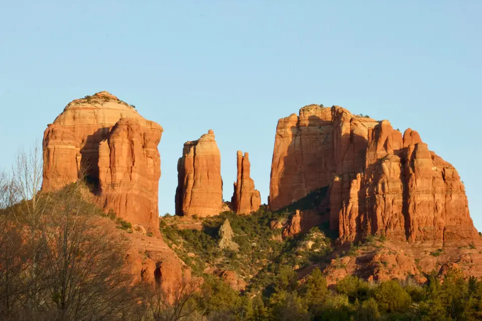 brown rock formation under blue sky during daytime — Sedona